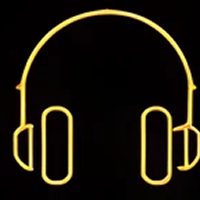 Neon yellow headphones on black background.