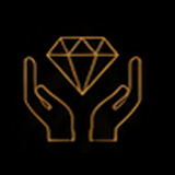 Hands holding a diamond on black background.